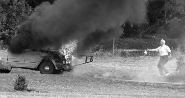 Dr. Jacobs attemts an impossible feat. Shot 1989. Won 1st place National Press Photograpers Associastion in 1989.