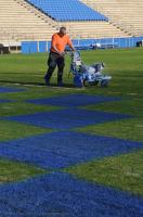 Don Bourgeois whos son is Byrnes High School's (71) Mitchell Bourgeois helps get the Rebels Nixon Field  ready, Thursday afternoon for Friday nights Second round 4A-Division I game with Mauldin High School.gpshj 11/28/09