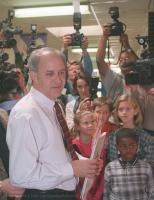 Jim Hodges looks at students work during a visit to North Elementary School in Lancaster Thursday where his son Luke goes to Kindergarten.