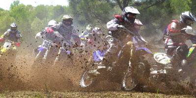 Bikers make their way through the course at the "Big Buck" 2005 Grand National Cross Country Series in Union Sunday.           (Stand Alone NEWS)