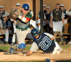 Spartanburg Cricket's catcher #27 Phil Morgan cant get the tag on Carolina Chaos's # 23 Jordan Robinson during the 2nd inning at USC Upstate Monday night, June 4, 2007.