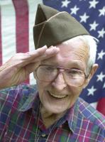 85 year old Ralph Lowe gives a salute near his Duncan Park home in Spartanburg S.C.. Lowe was in the first wave of soldiers on Omaha Beach in France June 6, 1945.Spartanburg Herald Journal Gerry Pate)